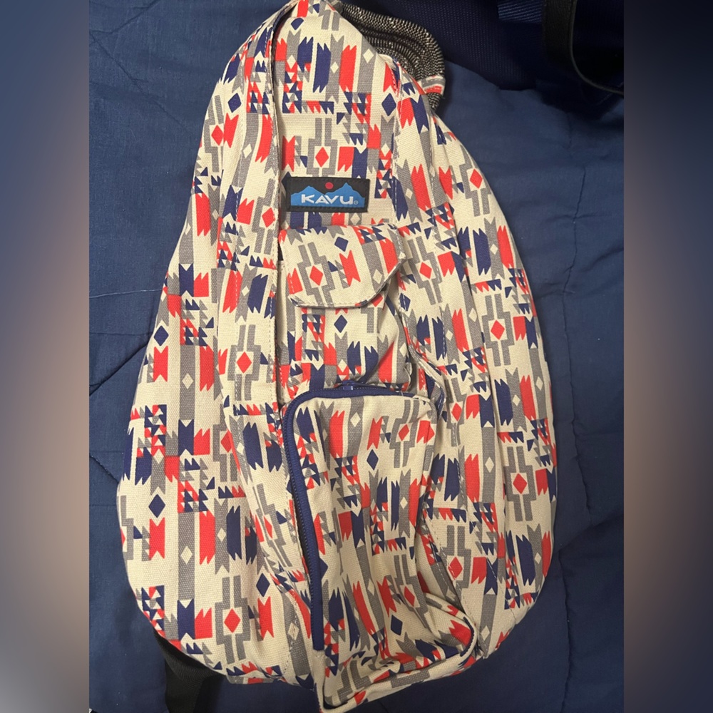 Kavu Geometric Sling Bag in Red, Blue, and Cream